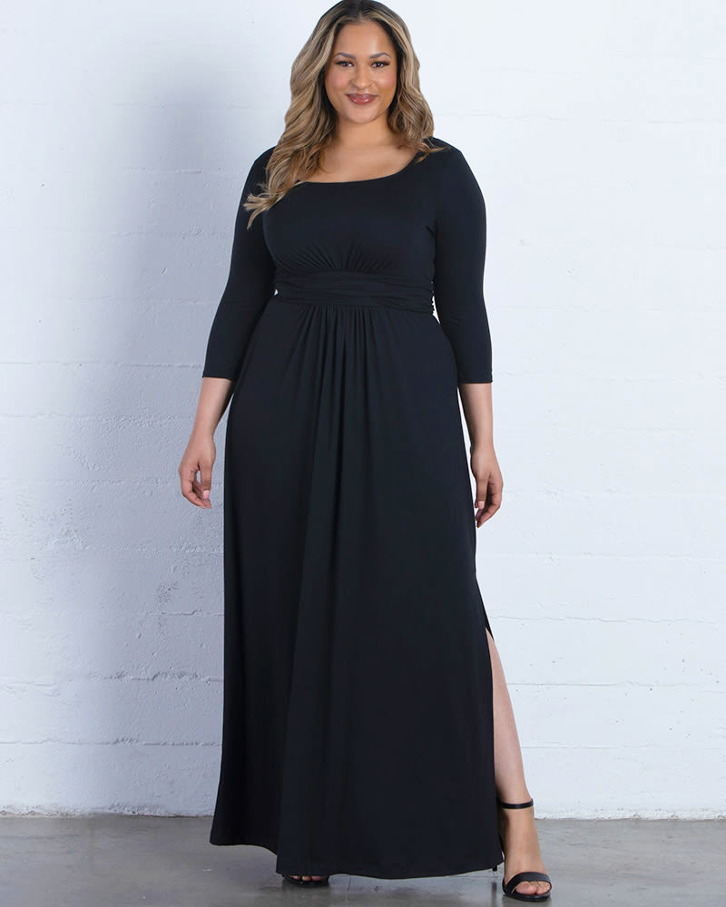 Front of a model wearing a size 0X Maya Maxi Dress in BLACK NOIR by Kiyonna. | dia_product_style_image_id:227415
